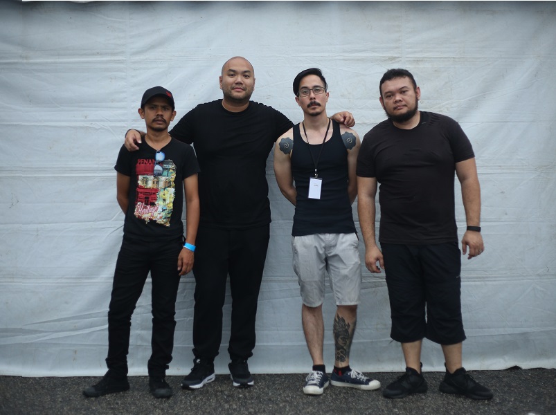 Zahid Yon [2nd from left] with DISAGREE band mates at Rock The World 2016. Image (L-R): Aziz, Zahid, David and Hamka.