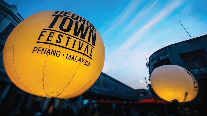 Georgetown Fest logo yellow Malaysia. Music Press Asia