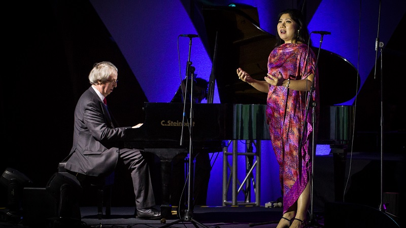 Sensual singer and piano at SIFMA Newswire by Music Press Asia
